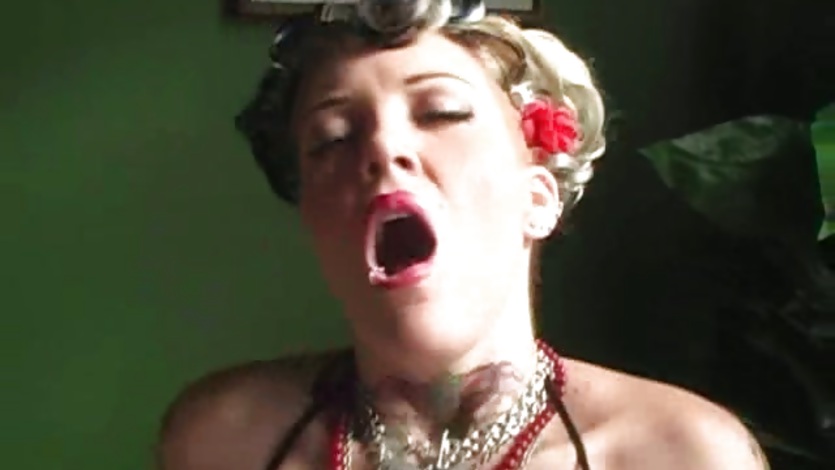 Candy Monroe is watched as she takes a black cock