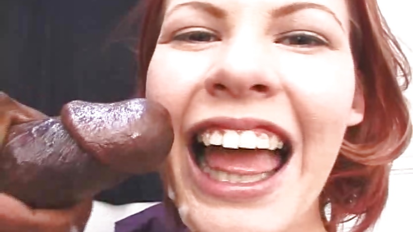 Black cock squirts its contents on redhead teen