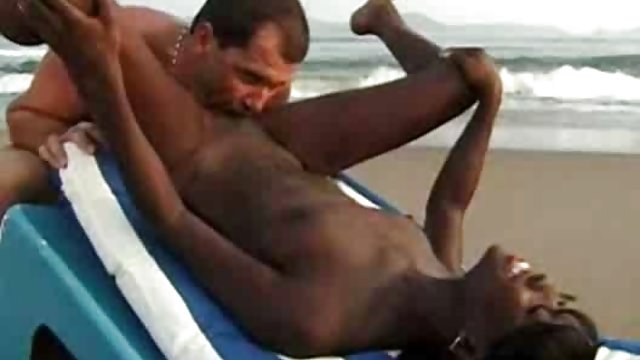 Interracial couple sex on the beach